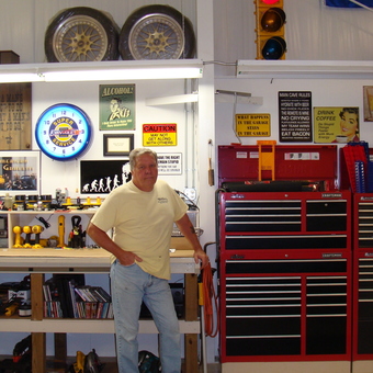 Organized garage with tool chests, workbench, and decor - Tony from Palatka, FL