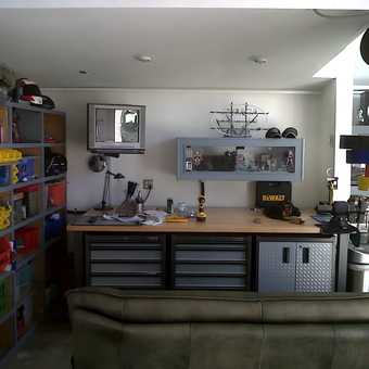 Organized garage with workbench, tool storage, and bins - Jay from Irvine, CA