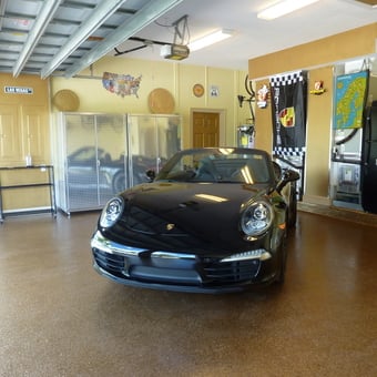 Luxury garage with diamond plate cabinets and Porsche decor - Leif from Davie, FL