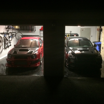 Organized garage with two cars and wall bike racks - A. W. from North Potomac, MD