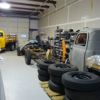 Classic Car Restoration Garage with Stacked Tires - Ford Guy from Erie, CO