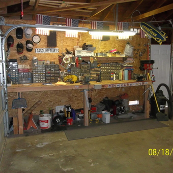 Organized garage workbench with storage bins and tools - Leo Klein from Lancaster, CA