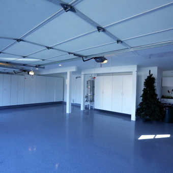 Organized Garage with White Cabinets and Workbench - Bill McIntire from San Diego, CA