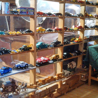 Wooden Display Shelves with Diecast Cars in Garage - TommyT from Williamsburg, VA