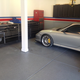 Organized garage with tool chests, cabinets, and sports car - MJR777 from Aurora, CO