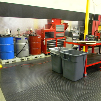 Organized garage with tool chests, workbench, and drums - Boss Man from Sparks, NV