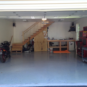 Organized garage with workbench, tool chests, and motorcycle - Brian from Danury, CT