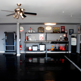 Organized garage with workbench, tool storage, and decor - Ron from San Luis Obispo, CA