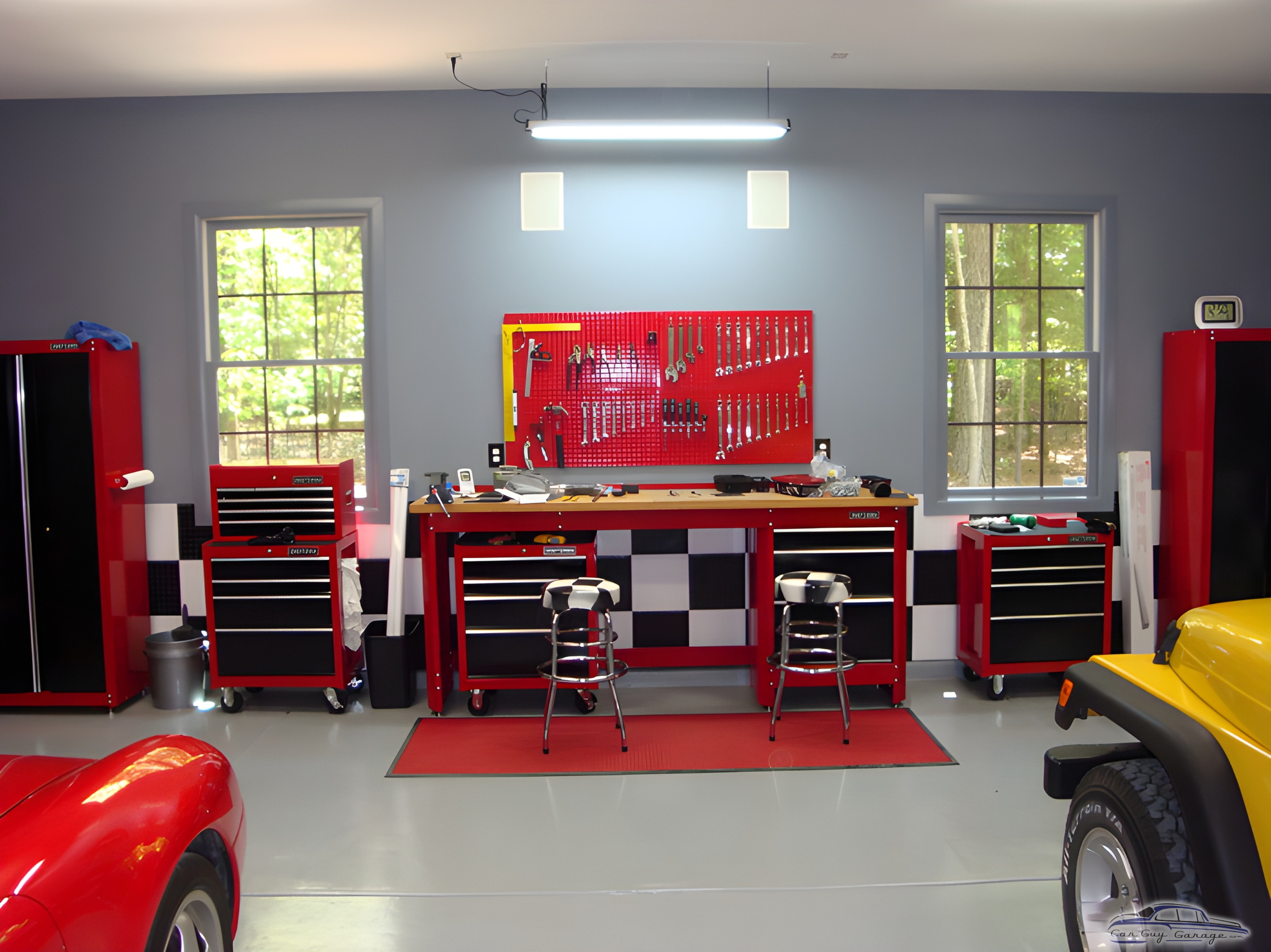 Organized garage with red tool cabinets and workbench - Jay from Blythewood, SC