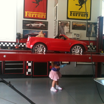 Red Toy Car on Lift, Ferrari Decor, Tool Cabinets - TBs Garage from Louisville, KY