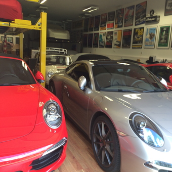 Luxury Garage With Car Lift And Wall Art - Dr Moo from Mount Horeb, WI