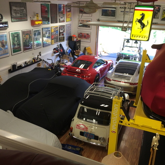 Luxury Garage with Car Lifts, Wall Art, and Ferrari Decor - Dr Moo from Mount Horeb, WI