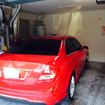 Two-car garage with red Mercedes and tools - Mercedes freak from Land O Lakes, FL
