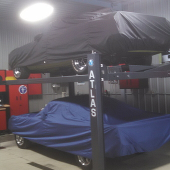 Atlas car lift with covered cars and red cabinets - Bruno from Lowellville, OH