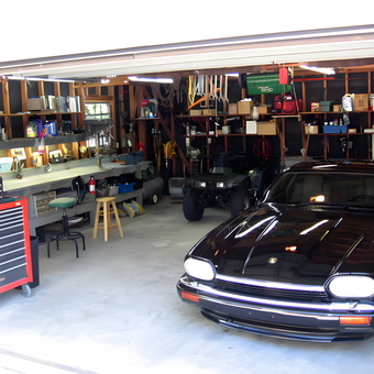 Organized garage with tool chest, workbench, and classic car - Bob Purves from Metairie, LA