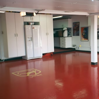 Red garage flooring with cabinets and posters - Andy from Orange, CA