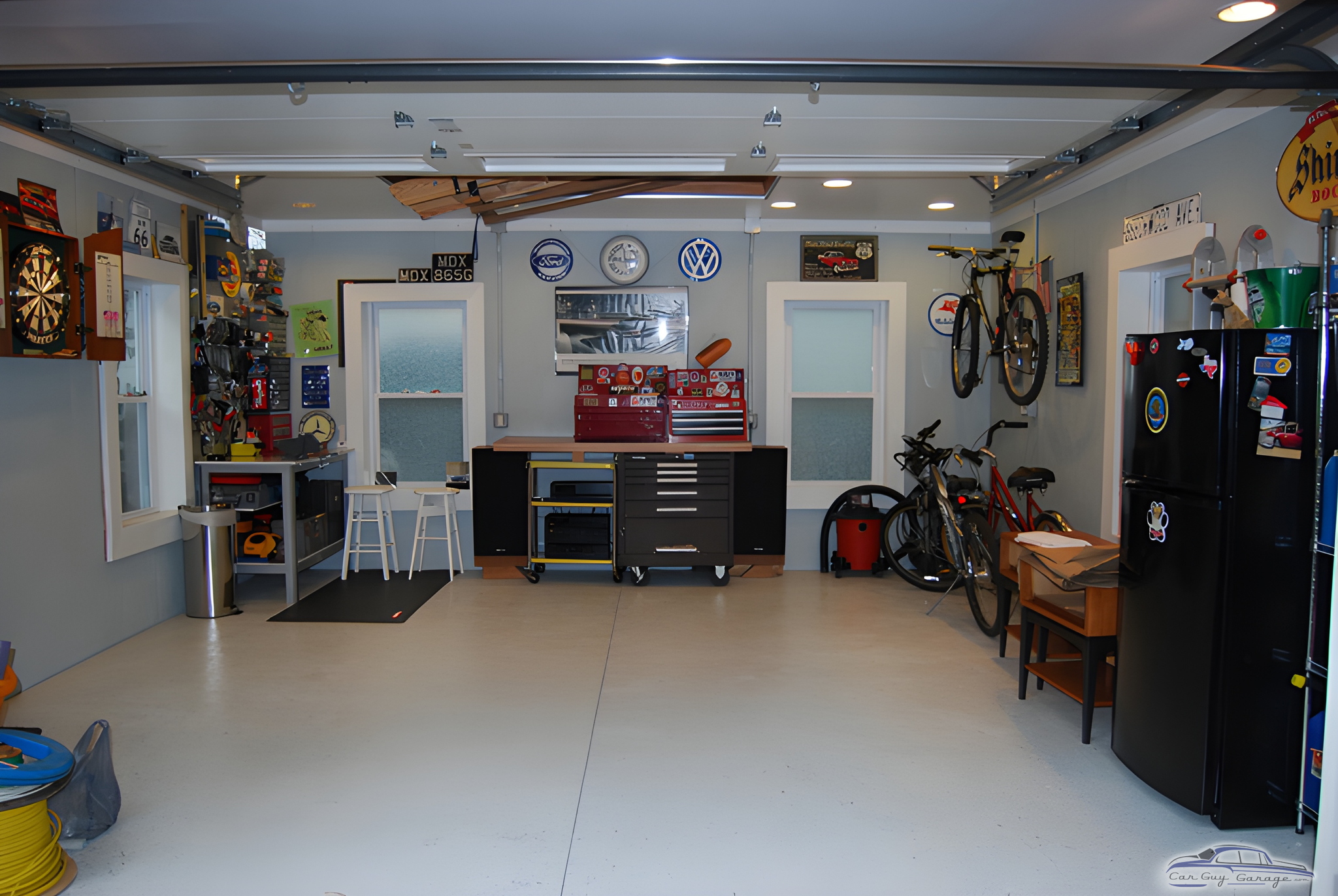 Organized garage with tool cabinets, workbench, and bike racks - Paul from Hopewell, NJ
