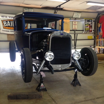 Classic Ford Hot Rod on Jack Stands in Garage - novatattoo from Canton, OH