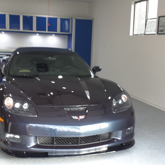 Modern garage with Corvette and blue cabinets - Dave from Highland, MD