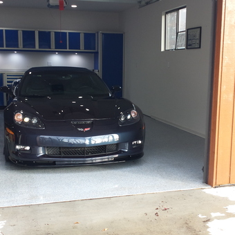 Organized garage with blue cabinets and Corvette - Dave from Highland, MD