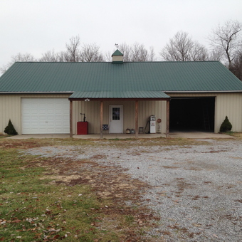 Spacious metal garage with green roof and pump - Walter Brumfield from Nicholasville, KY
