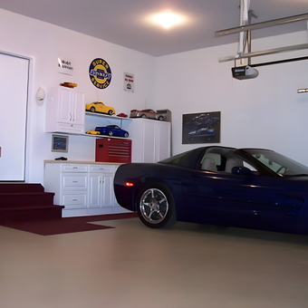 Organized garage with storage cabinets and Corvette - Gary from Waukee, IA