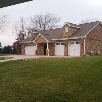 Three Car Garage With Stone Exterior and White Doors - EricC from Irwin, PA