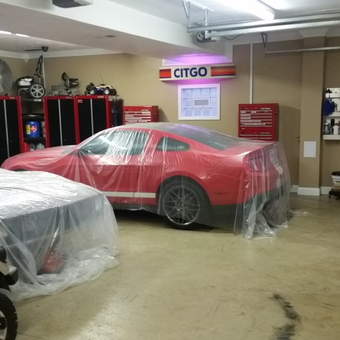 Organized garage with tool cabinets, car covers, and air compressor - EricC from Irwin, PA