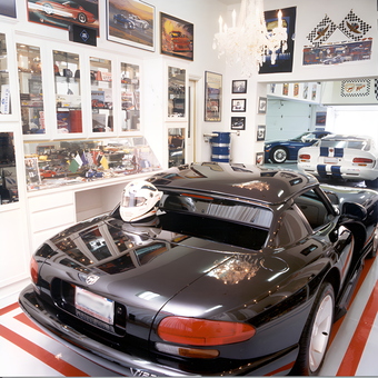 Luxury Garage With Dodge Vipers, Racing Decor, and Display Cases - Anonymous