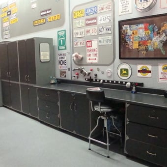 Garage With Metal Cabinets and License Plate Decor - The Mintle Barn from Fallbrook, CA