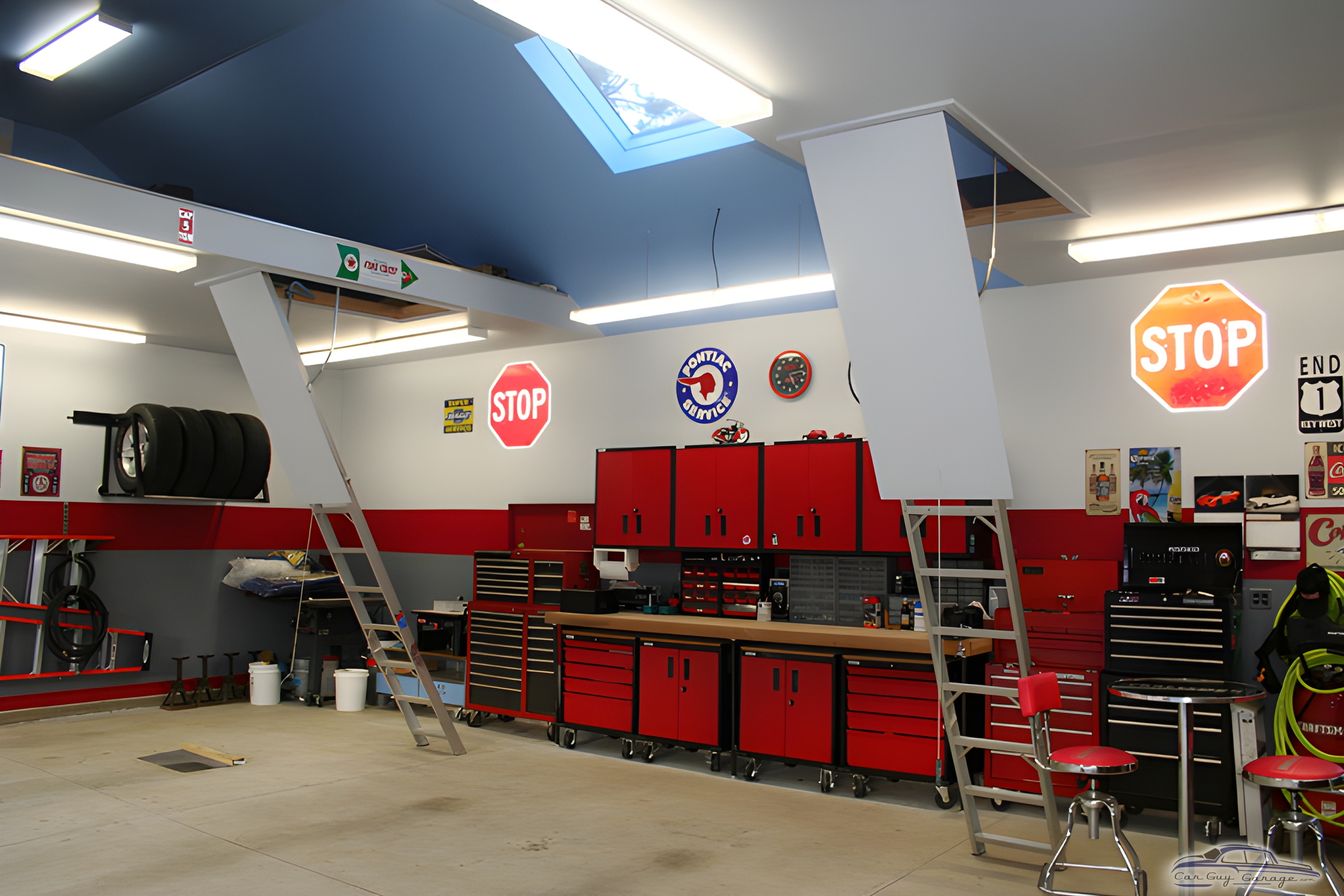 Organized garage with red cabinets and stop signs - Perry from Woodbury, NY