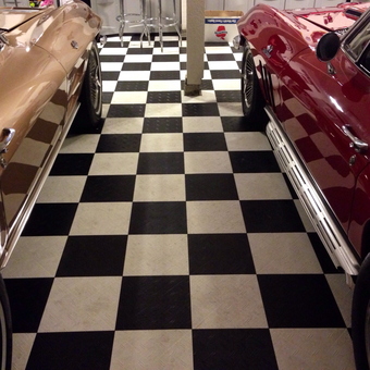 Classic Garage With Checkered Flooring and Bar Stools - Dooboy from Vancouver