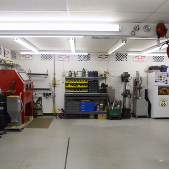 Organized garage with red tool chests and workbench - Rick from Hurricane, WV