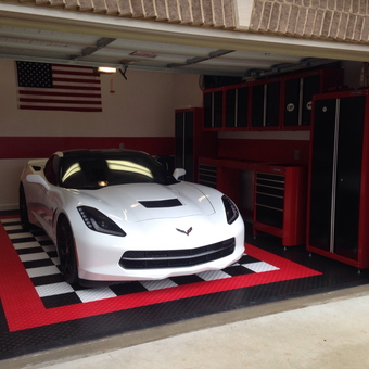 Modern garage with Corvette, cabinets, and flooring - Donald P from Athens, AL