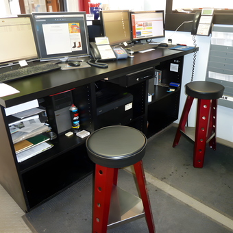 Red Shop Stools with Black Seats at Garage Workstation - Shop Stools