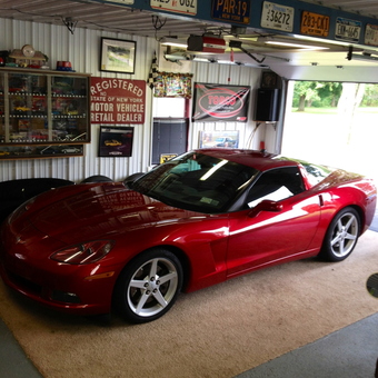 Red Corvette in Decorated Garage with License Plates - PRO-STREET STYLES from RANDOLPH, NY