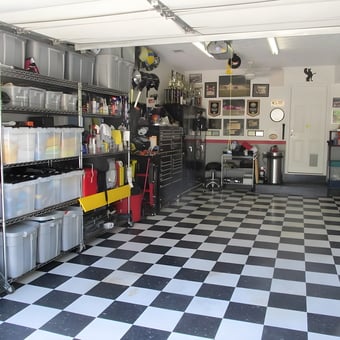 Organized garage with shelving, storage bins, and checkered floor - michael shortt from Savannah, GA
