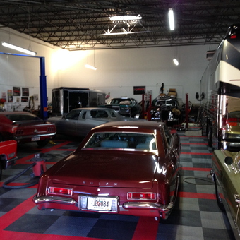 Classic Cars and Garage Equipment on Checkered Floor - Winch from Marietta, GA