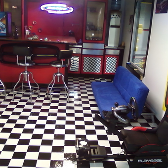 Garage bar with racing seat and checkered floor - Martee from Grand bay, AL