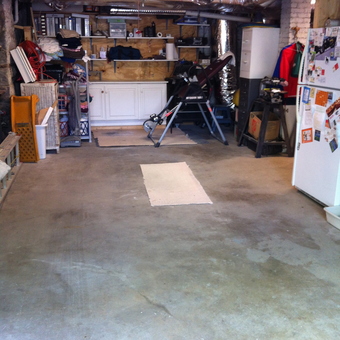 Organized garage with workbench and storage shelves - Little space garage from Nashville, TN