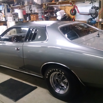 Classic Car with Chrome Wheels in Organized Garage - Donald Howe from Charlotte, MI