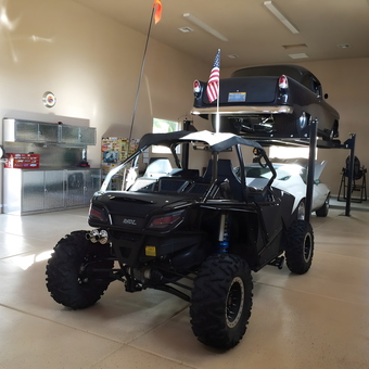 Spacious garage with car lift and storage cabinets - AJ Long from Las Vegas, NV