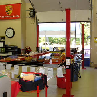 Garage with Car Lift, Racing Decor, and Wall Clocks - Barry from Chicago, IL