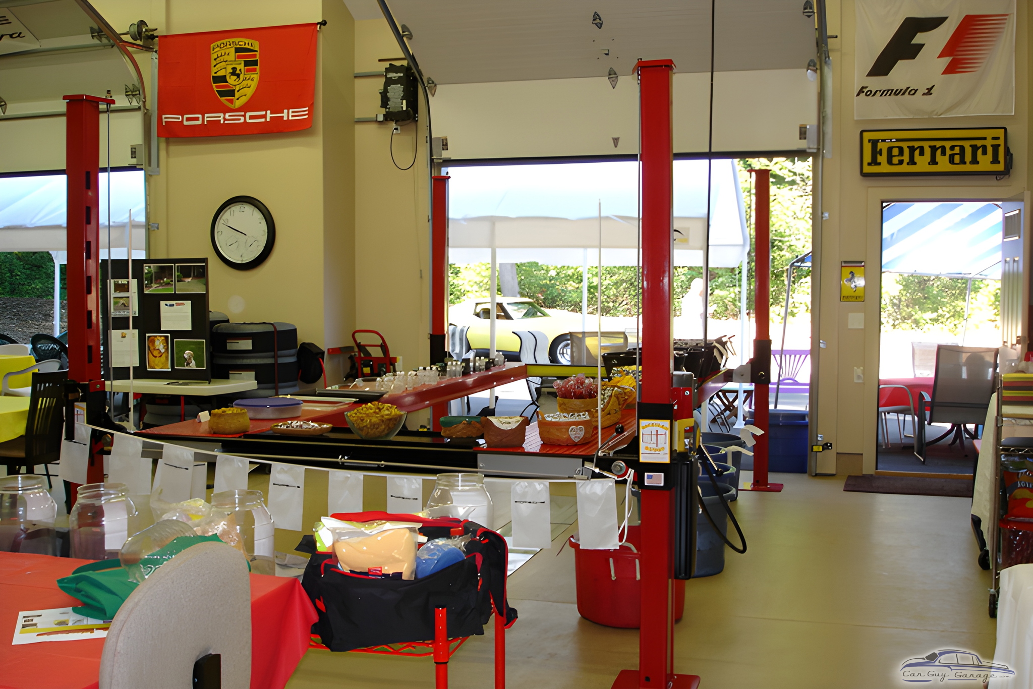 Garage with Car Lift, Racing Decor, and Wall Clocks - Barry from Chicago, IL