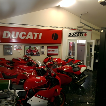 Ducati Motorcycle Collection with Wall Art and Signage - Zack from Silver Spring, MD