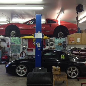 Home garage with car lift, tool cabinets, and sports cars - William from Penn Yan, NY