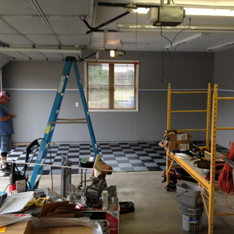 Garage makeover with checkered floor tiles and shelving - Gogo from Southgate