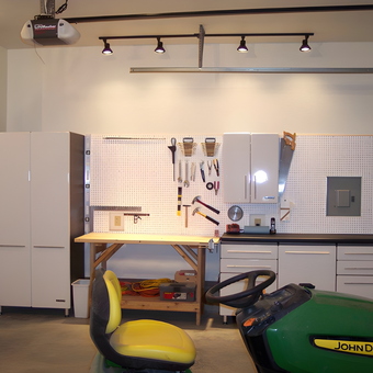 Organized garage with cabinets, pegboard, and workbench - Tom from Foothill Ranch, CA