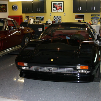 Classic car garage with wall cabinets and decor - Prince Harry from Kirkland