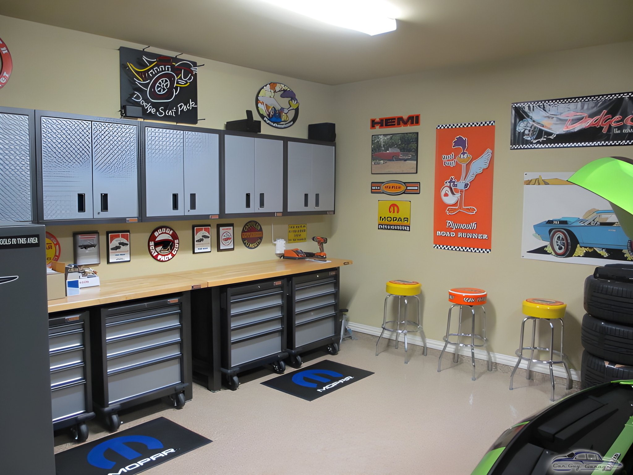 Organized Garage with Cabinets, Workbench, and Wall Decor - Bob C